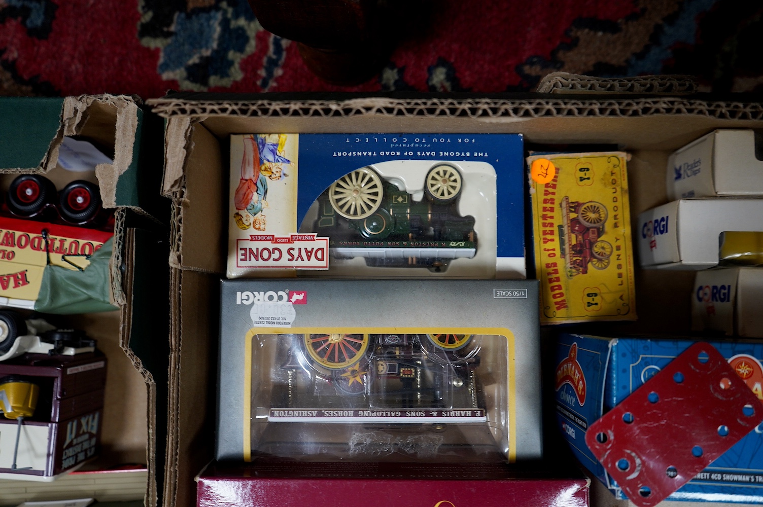 A collection of fairground related vehicles by Corgi, Matchbox, etc. including ten boxed examples; a Garrett Showman’s Tractor (CC20301), a Models of Yesteryear Fowler (Y-9), a Burrell Showman’s Steam Wagon and cardboard